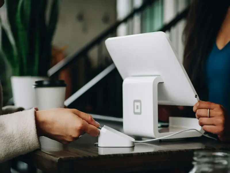 Card payment being made at a modern shop counter